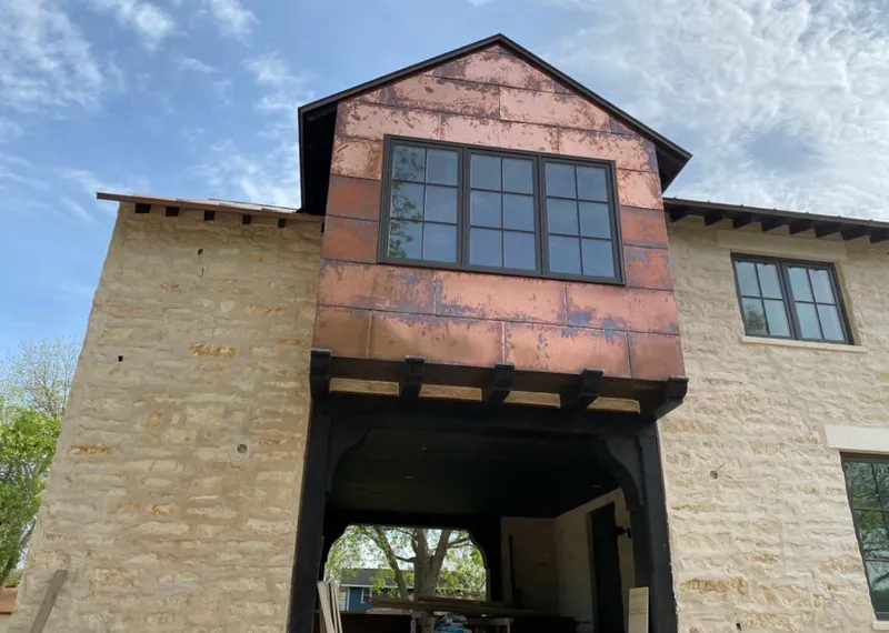 Copper metal panel facade on a stone building for Metal Roof Coating in Pinellas Park