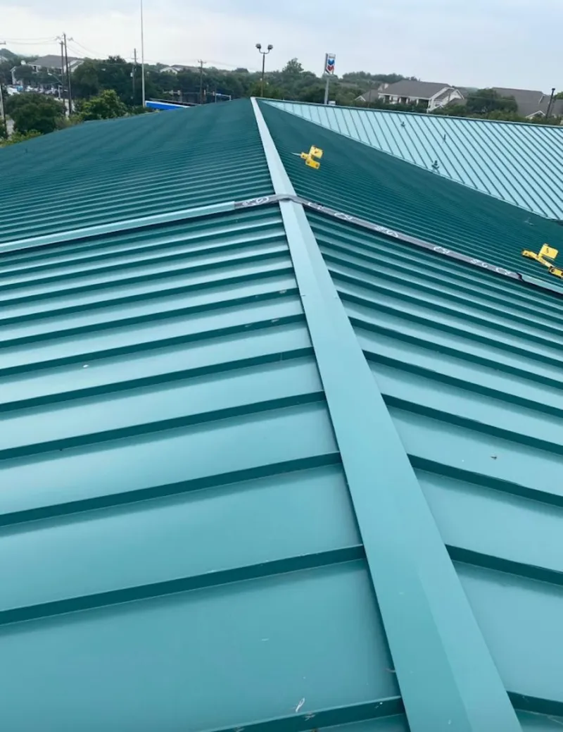 Green commercial metal roof ridge and valley for Metal Roof Repair in Pinellas Park